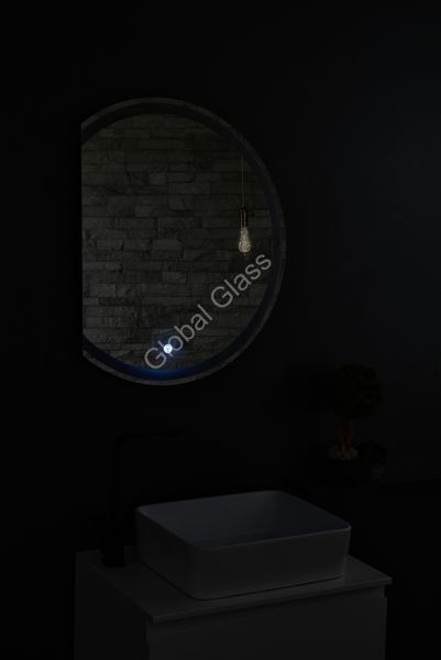 Зеркало с LED подсветкой и сенсором 650х800мм. в ванную комнату круглое,срез слева MR-17 Global Glass MR-17 фото